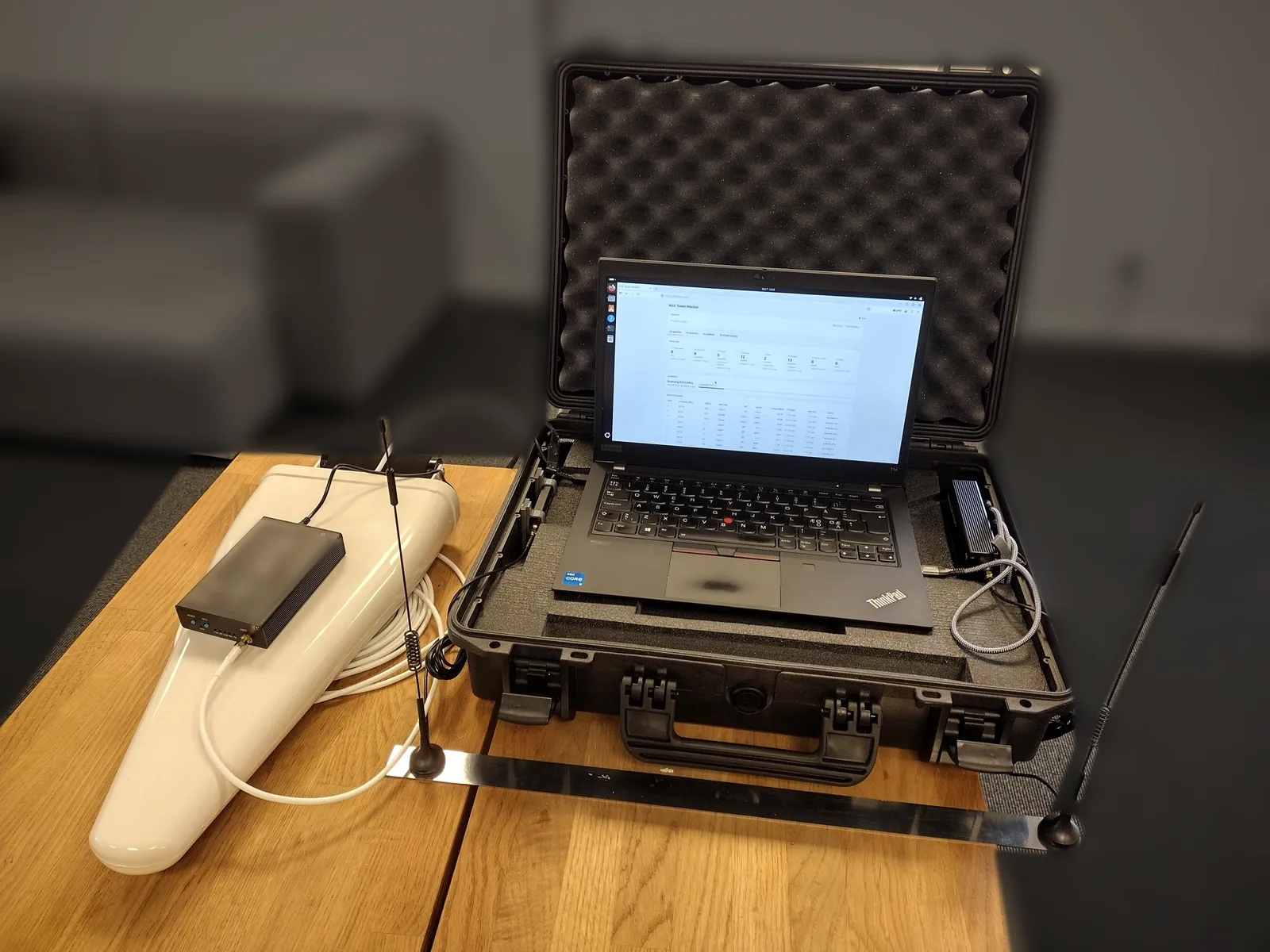 The IMSI catcher detector in its transport case with laptop, receiver and antennas